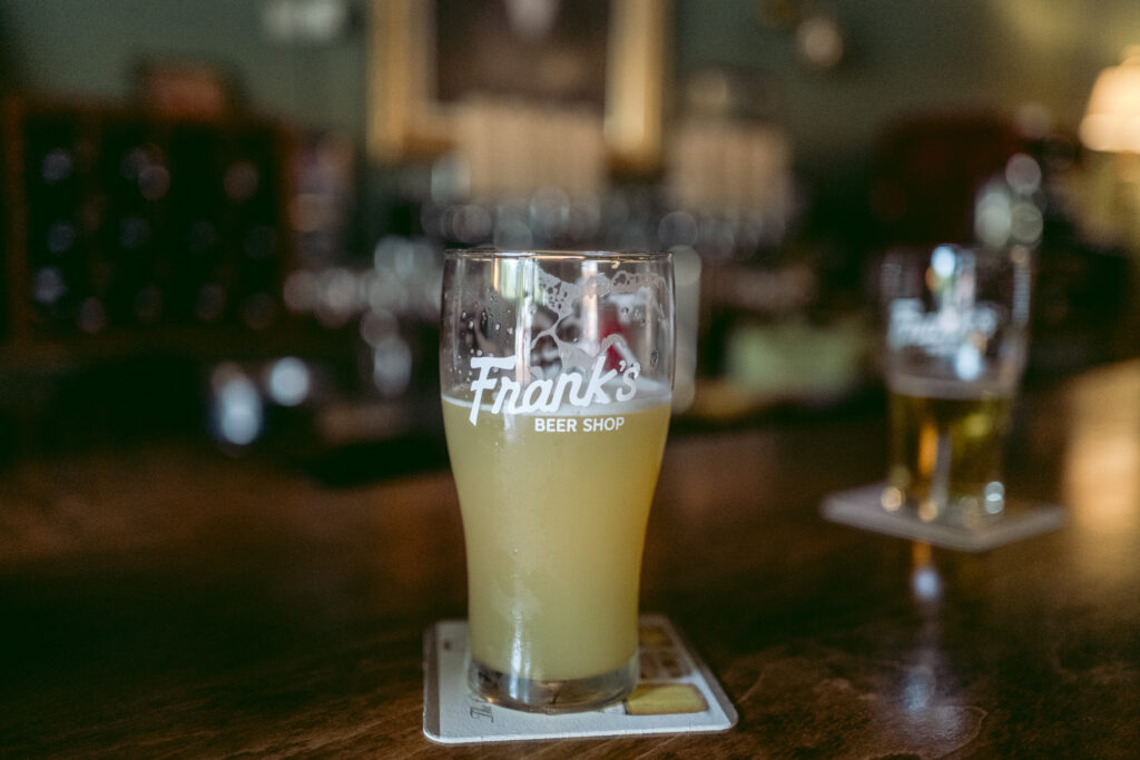 Frank's Beer Shop opened at 3348 Commonwealth Ave in early June. Photo by Jim McGivney