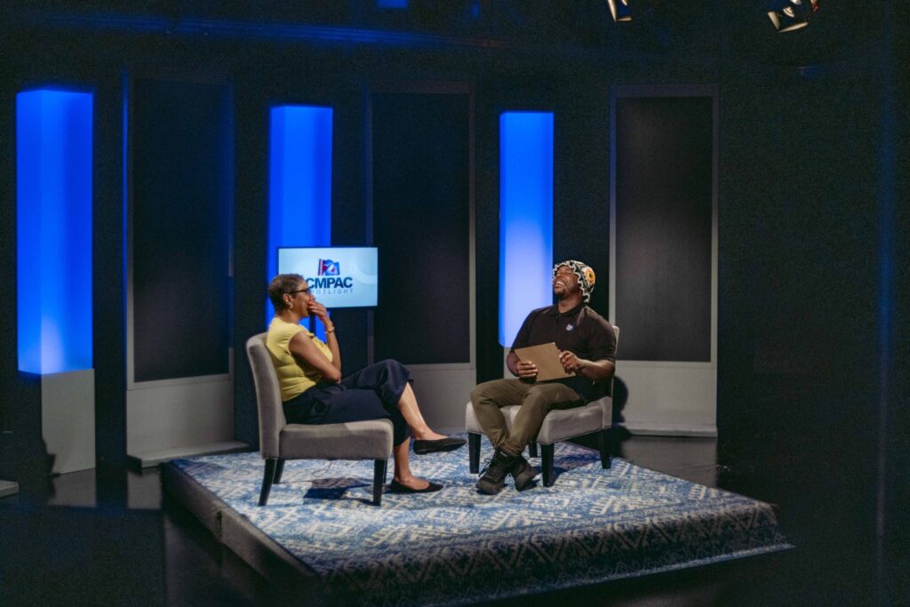 Keith Roberson (right) chats with Access 21 podcaster Arritta Pruitt for an episode of “CMPAC Spotlight.” Photo by Logan Cyrus