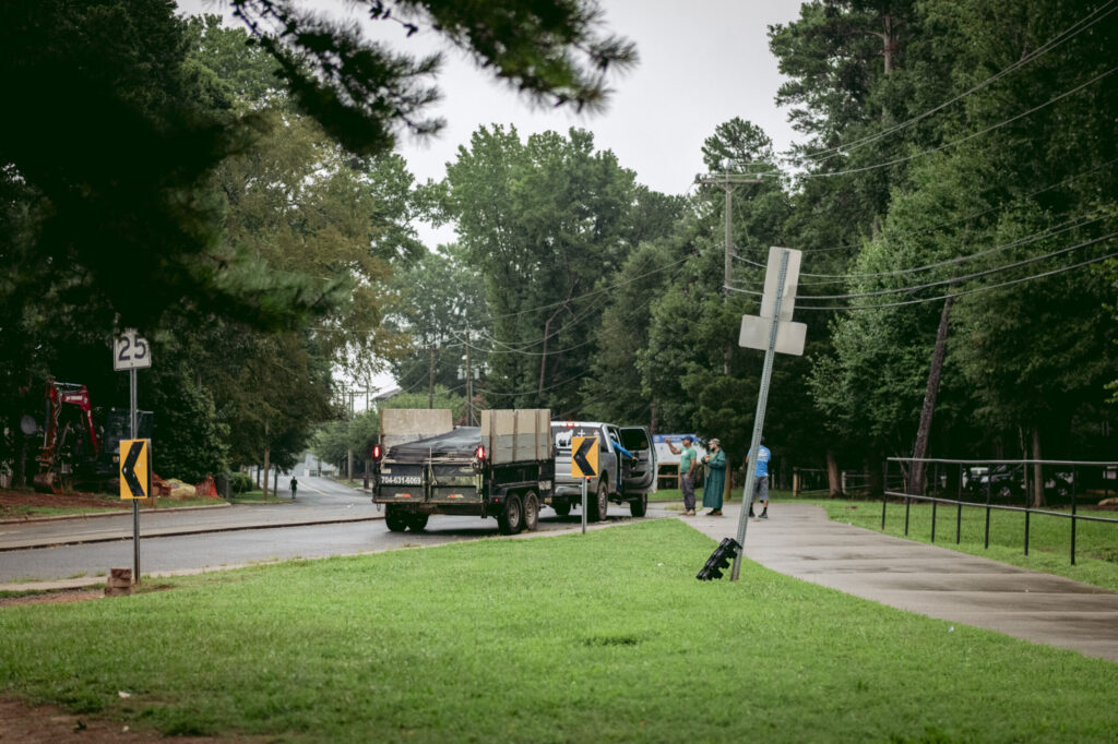 A man gets into a truck to take a job along Wendover Road