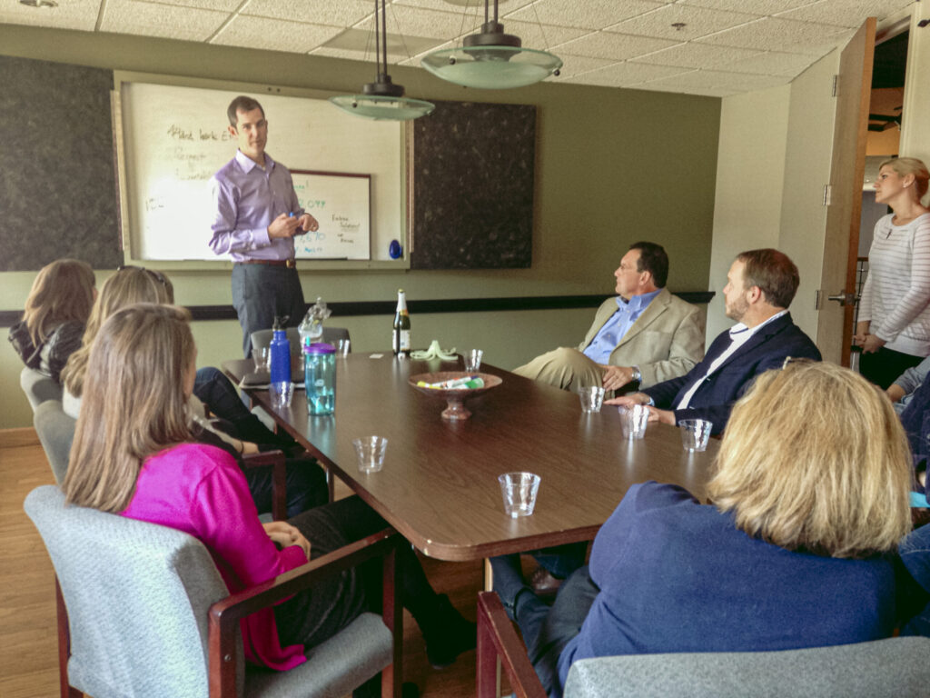 Publisher Rick Thurmond talking to the team in 2014. Photo by Logan Cyrus